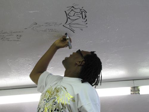 KRS-ONE signs the Ceiling of Fame!